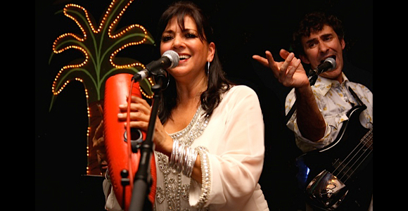 Photo of Martha Acosta and Javier Fioramonti of Latin band Manteca.