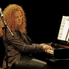 Janette Mason deep in Piano heaven 